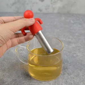 Silicone man tea infuser with stainless steel mesh strainer for loose leaf tea brewing.