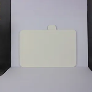Plastic cutting board for kitchen fruit and baby food prep, durable kitchen utility tool.