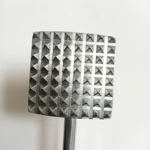 Aluminum meat tenderizer hammer head closeup kitchen tool steak pounder metal gadget