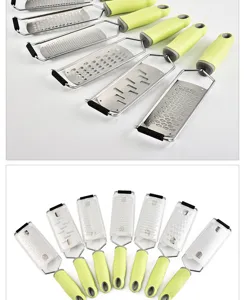 Stainless steel cheese grater with green PP handle, perfect for kitchen zesting and shredding.
