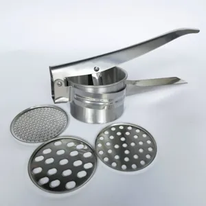 Stainless steel manual potato ricer detail view with three interchangeable mesh discs for kitchen.