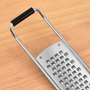 Stainless steel multi-functional kitchen grater for cheese, lemon, and chocolate.