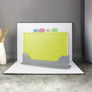 Plastic cutting board set of 4 with storage stand, color-coded chopping boards for kitchen.