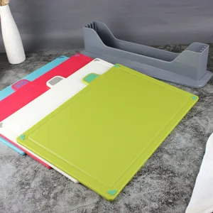 Plastic classified cutting board detail view, 4-piece set with holder for kitchen use.