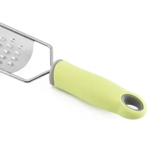 Stainless steel cheese grater with green handle for lemon zesting and kitchen use.