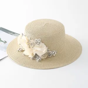 Eleganter Strohsonnenhut mit Blumen und Strass für Damen breite Krempe Strand UV Schutz