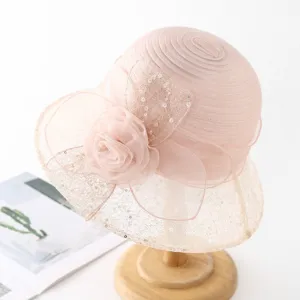 Pink organza lace sun hat detail, elegant floral decoration and lightweight breathable fabric.