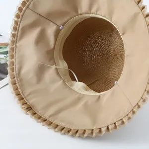Detail shot showing the inner lining and delicate organza ruffle edge of the women sun hat.