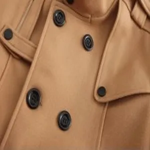 Men's wool blend trench coat detail, classic camel winter overcoat with double breasted buttons.