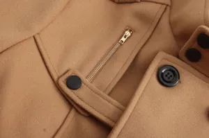 Men's wool coat detail view, classic camel fabric with zipper pocket and black buttons.
