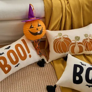 Halloween throw pillow cover with cute pumpkin and bat embroidery for festive home decor.
