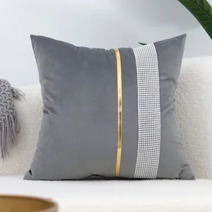 Gray velvet throw pillow cover with elegant vertical rhinestone and gold stripe design.