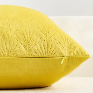Yellow velvet pillowcase detail, quilted ginkgo leaf pattern, soft texture, home decor cushion cover.