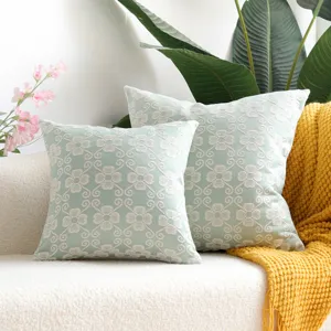 Detailed view of modern minimalist jacquard pillow cover featuring elegant floral pattern for sofa.