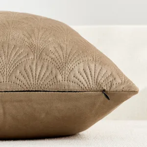 Ginkgo leaf embossed velvet throw pillow cover detail, showcasing soft texture and hidden zipper.