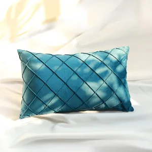 Velvet throw pillow cover featuring pinch pleated diamond grid pattern in teal blue, soft texture.