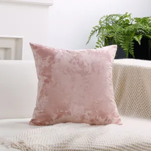 Pink velvet throw pillow cover detail shot showing soft plush texture and cozy home sofa decor.