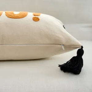 Decorative throw pillow cover with embroidery and black tassel for living room and sofa.