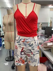 Women red camisole and floral print shorts set with stylish belt casual summer outfit