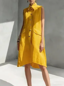 Summer solid color lapel sleeveless casual loose cotton midi dress detail shot showing buttons.