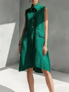 Detail view of a solid color lapel sleeveless casual loose cotton dress for women.