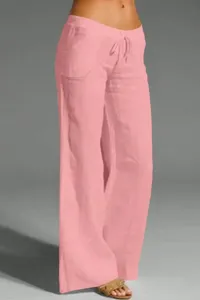 Details of pink linen casual wide leg pants with comfortable drawstring waist design.