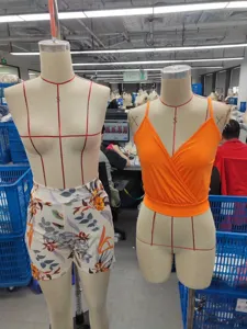Summer casual women camisole and plant print shorts set, stylish cross strap crop top outfit.