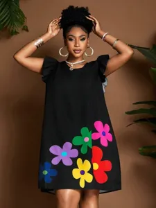Close-up view of the black short sleeve dress featuring colorful floral hem details.