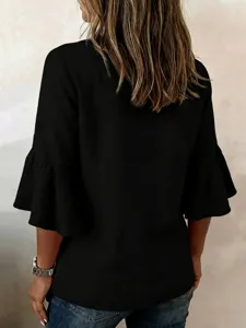 Detail view of the black flare sleeve casual blouse, showcasing elegant back design and fabric.