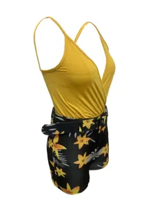 Women V-neck camisole and floral print shorts set with belt detail view, trendy outfit.