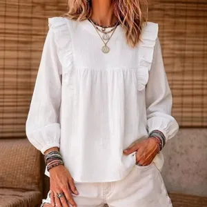 Bohemian style women's white blouse with ruffles and long bubble sleeves for daily wear.
