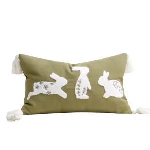 Easter rabbit throw pillow cover with tufted bunny design and tassels in olive green linen.