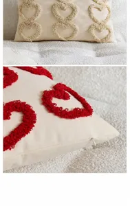 Beige cushion cover with red and beige tufted heart embroidery, soft velvet fabric, hidden zipper.