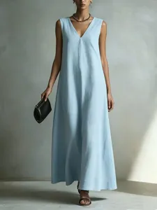 Close-up detail of the elegant light blue sleeveless V-neck maxi dress fabric and design.