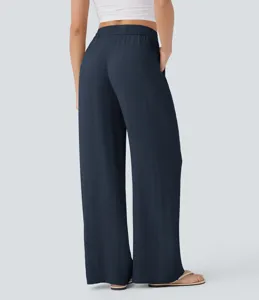 Back view detail of women high waisted wide leg casual pants featuring comfortable elastic drawstring waist.