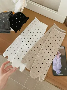 Detailed view of women thin split toe socks with cute polka dots, perfect for spring and summer.