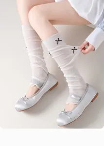 Detailed view of summer thin knit leg warmers with cute bows, breathable mesh design stylish.