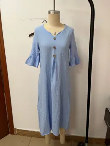 Light blue V-neck linen dress featuring front buttons and elegant ruffle sleeves for women.