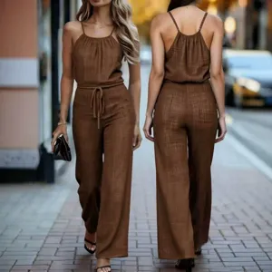 Stylish brown textured spaghetti strap jumpsuit with waist drawstring and wide leg design.