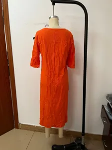 Orange cotton linen midi dress for women, casual V-neck design with stylish ruffle sleeves.