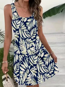 Detailed view of women's sleeveless tropical leaf print mini dress in navy blue, casual.