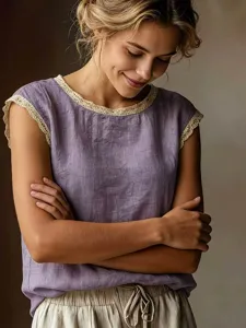 Close-up detail of a vintage linen sleeveless top with delicate lace trim for women daily wear.