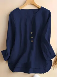 Detailed view of women casual long sleeve notch neck button shirt in dark blue color.