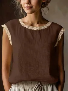 Close-up view showing the vintage lace-trim round neck sleeveless linen top detail.