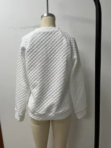 Back view detail of white quilted casual sweatshirt showcasing the unique texture and fit.