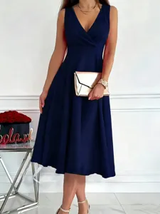 Close-up view of the elegant sleeveless V-neck midi dress, showcasing its fitted waistline.