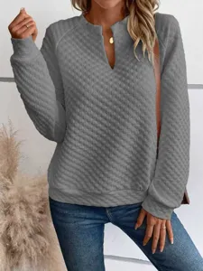 Women's casual long sleeve deep V-neck quilted solid color sweatshirt for autumn.