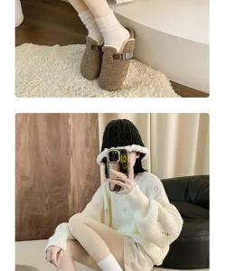 Cozy coral fleece socks paired with winter clogs and knitted sweater for ultimate autumn warmth.