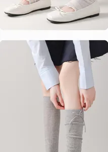 Japanese JK style knit leg warmers for women, featuring a cute bow and breathable mesh design.