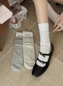 Detail view of Korean style ultra-thin mesh stack socks for women, breathable summer wear.
